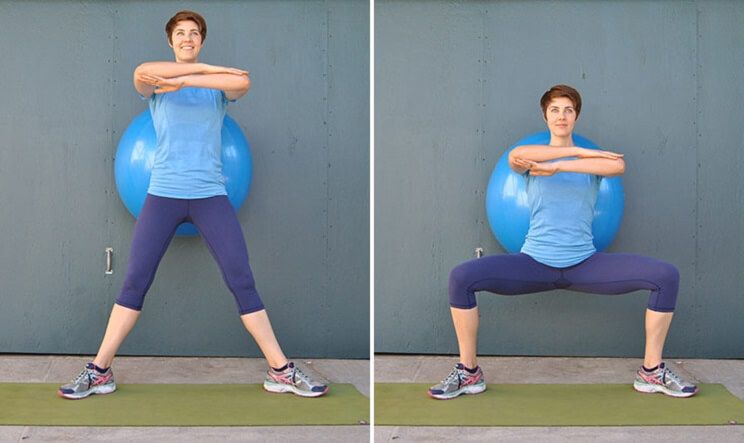 Wall Squats With Ball Between Knees wall-squats-with-ball-between-knees